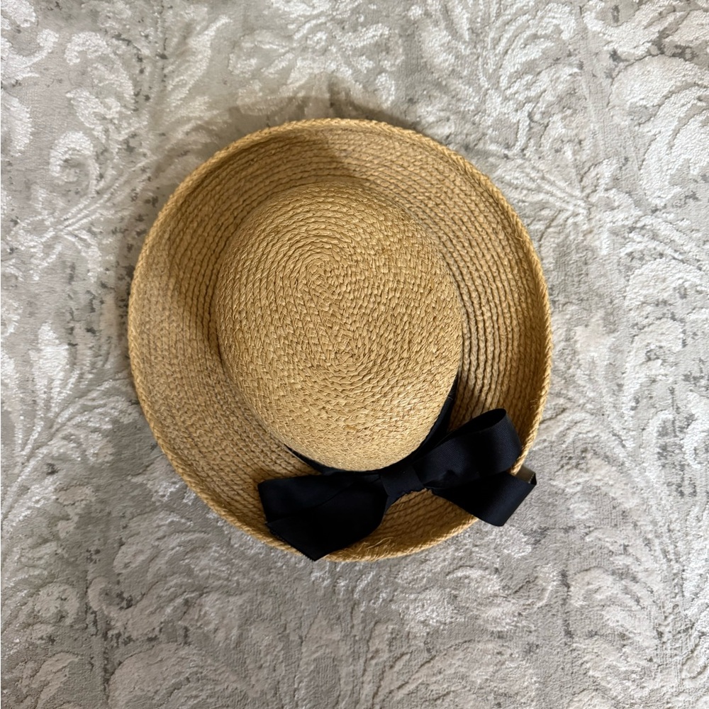 Stylish Straw Hat with Black Bow